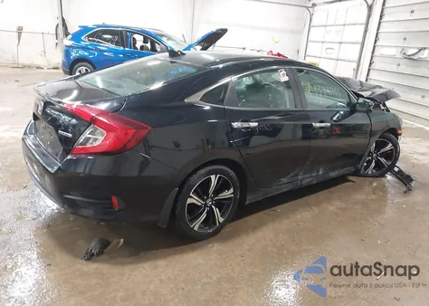 2018 Honda Civic Touring z USA, uszkodzony, nr VIN 19XFC1F99JE200672